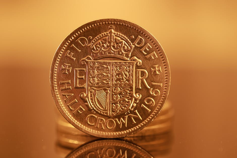 Detailed image of a 1964 British half crown coin with a royal shield design.